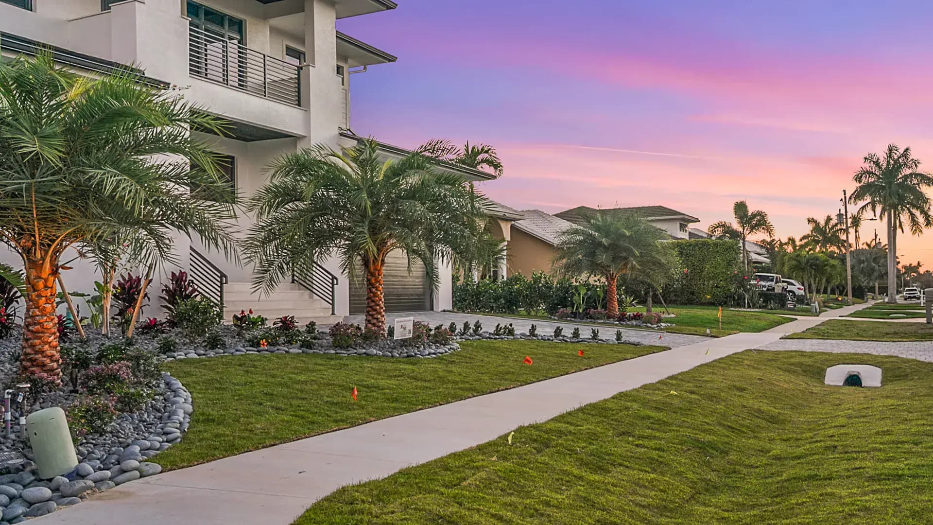 Professionally landscaped home at twilight